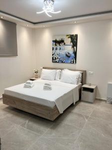 Postel nebo postele na pokoji v ubytování Clio Luxury Apartments