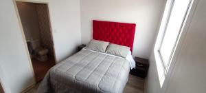 Ένα ή περισσότερα κρεβάτια σε δωμάτιο στο Condominio portal pacifico II +8 φωτογραφίες