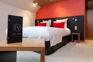 Postel nebo postele na pokoji v ubytování Hotel Restaurant Spa Ivan Vautier