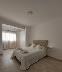Ένα ή περισσότερα κρεβάτια σε δωμάτιο στο DUPLEX 2
