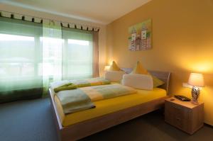 Postel nebo postele na pokoji v ubytování Park-Hotel Leimen