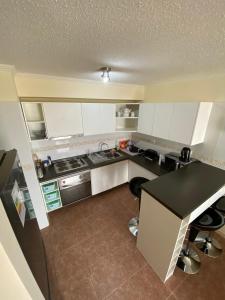 Η κουζίνα ή μικρή κουζίνα στο Condominio portal pacifico II