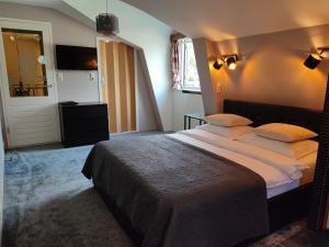 Postel nebo postele na pokoji v ubytování B&B Hotel Elselina