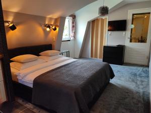 Postel nebo postele na pokoji v ubytování B&B Hotel Elselina