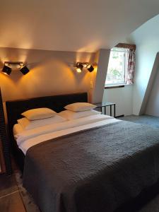 Postel nebo postele na pokoji v ubytování B&B Hotel Elselina