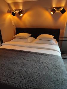 Postel nebo postele na pokoji v ubytování B&B Hotel Elselina