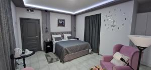 Ένα ή περισσότερα κρεβάτια σε δωμάτιο στο Apartmani i sobe Gromilovic