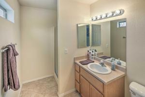 a bathroom with a sink and a mirror at Arizona Retreat with Casita about 2 Mi to Lake Havasu in Lake Havasu City +31 photos