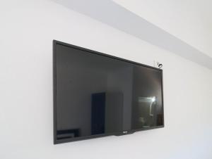 TV a/nebo společenská místnost v ubytování Neranxi Apartament