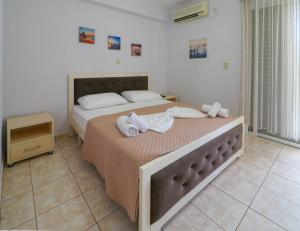 Postel nebo postele na pokoji v ubytování Neranxi Apartament