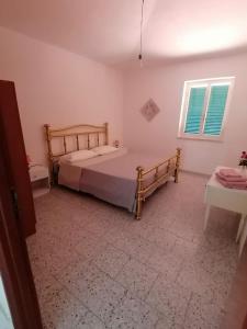 Postel nebo postele na pokoji v ubytování Villa Bianca
