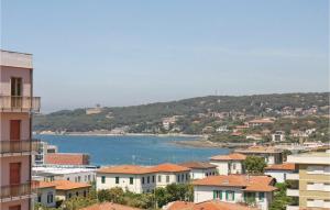 a view of a city with a body of water at Roberta in Rosignano Solvay