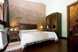 Cama o camas de una habitación en Casa Rural Finca Valvellidos