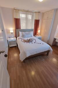 Voodi või voodid majutusasutuse Hotel Sandmelis toas