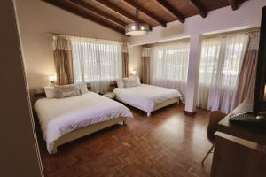 Postel nebo postele na pokoji v ubytování Hotel Sandmelis + 37 fotografií