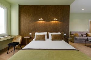 Кровать или кровати в номере Dreamers' Rooms Sorrento