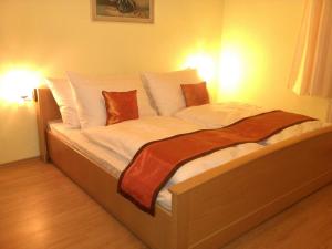 Letto o letti in una camera di Pension VIDHOUS 1