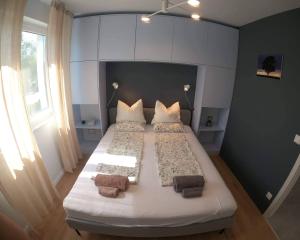 Posteľ alebo postele v izbe v ubytovaní Azurro + 18 fotografií