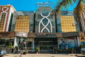 a building with an art center in front of it at Aracan Portsaid in Port Said