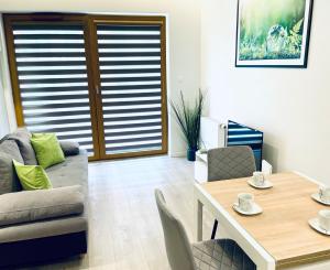 Posedenie v ubytovaní Modern Silver Apartment