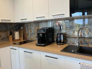 Kuchnia lub aneks kuchenny w obiekcie Apartament Doro