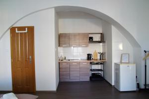 Kuchyňa alebo kuchynka v ubytovaní Apartment Porta