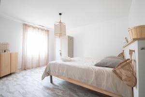 Posteľ alebo postele v izbe v ubytovaní Casa Mat'Yse