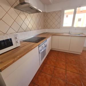 Kuchnia lub aneks kuchenny w obiekcie Casa M de mar - Dúplex con vistas