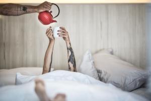 Łóżko lub łóżka w pokoju w obiekcie Hotel die Arlbergerin -New- all-in super flex rate