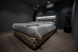 Postel nebo postele na pokoji v ubytování DiVino Rooms Deluxe