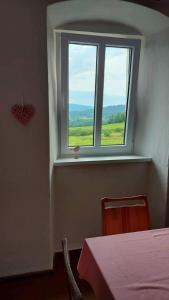 Letto o letti in una camera di Chalupa U Kolibříka