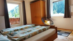 A bed or beds in a room at Appartment Florian