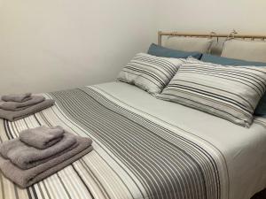 Posteľ alebo postele v izbe v ubytovaní Studio 25 apartment - near metro M3