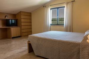 TV a/nebo společenská místnost v ubytování Hotel Poggio Bertino