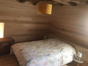 Posteľ alebo postele v izbe v ubytovaní La Maison de LAZ , maison de caractère entièrement rénovée 2022