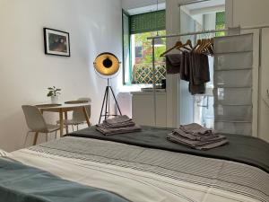 Posteľ alebo postele v izbe v ubytovaní Studio 25 apartment - near metro M3