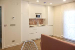 Kuchnia lub aneks kuchenny w obiekcie Apartamentos La Quinta