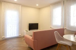 Telewizja i/lub zestaw kina domowego w obiekcie Apartamentos La Quinta