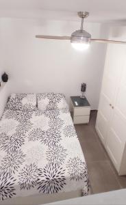 Posteľ alebo postele v izbe v ubytovaní Apartamento CANDELA