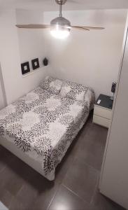 Posteľ alebo postele v izbe v ubytovaní Apartamento CANDELA
