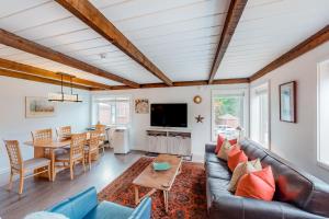 a living room with a couch and a table at Sun & Ski in Sun Valley