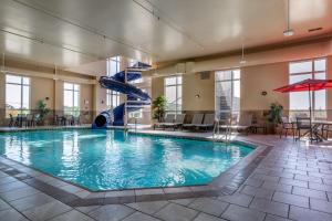 a swimming pool with a slide in a hotel room at Best Western Plus Bridgewater Hotel & Convention Centre in Bridgewater