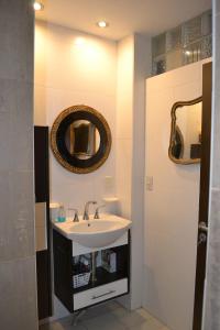 a bathroom with a sink and a mirror at PERFECTO ESPACIO in Santiago del Estero