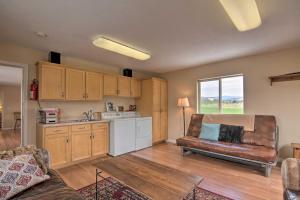 a living room with a couch and a kitchen at Charming Barn Apt in Boulder! Gateway to Parks! in Boulder Town +19 photos