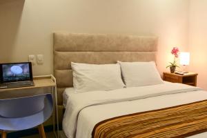 Postel nebo postele na pokoji v ubytování Casa Lorenza Hotel