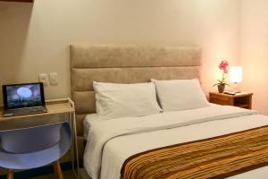 Postel nebo postele na pokoji v ubytování Casa Lorenza Hotel