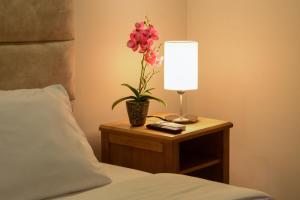 Postel nebo postele na pokoji v ubytování Casa Lorenza Hotel