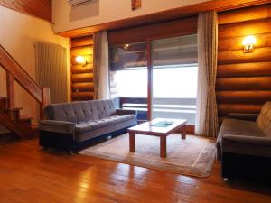 
A seating area at Log Hotel Larch Lake Kanayama
