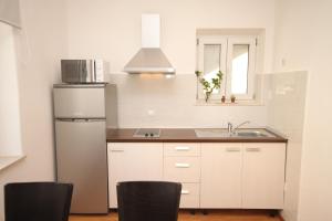 Fotografie z fotogalerie ubytování Apartments with WiFi Omis - 6772 v Omiši