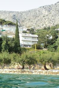 Fotografia z galérie ubytovania Apartments by the sea Omis - 8334 v Omise